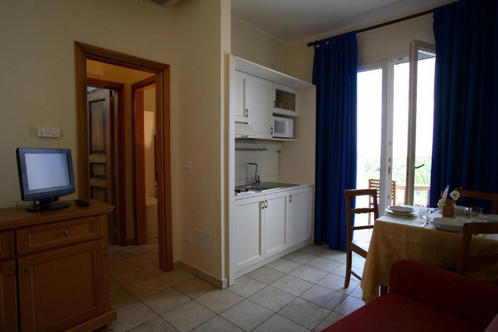 Hotel Resort Portoselvaggio Sant Isidoro  Kamer foto